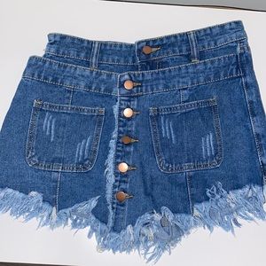 Jean short/skirt size medium. Royal blue color with rustic buttons.